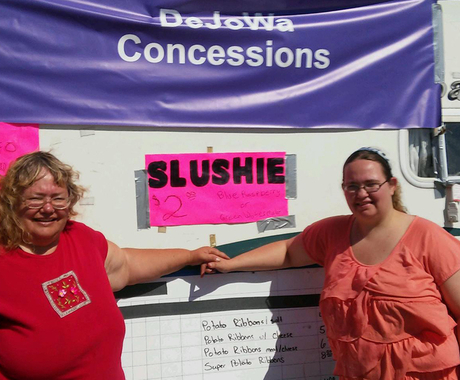 Two women and concession trailer