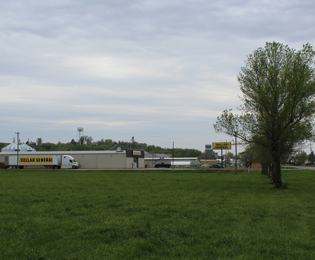 Dollar General store with Dollar General truck outside of small town