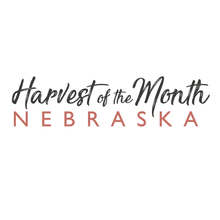 Harvest of the Month Nebraska logo, black and red lettering