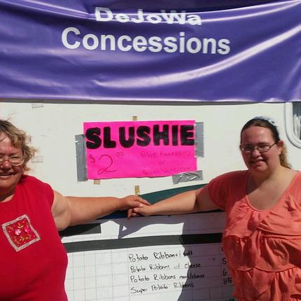 Two women and concession trailer